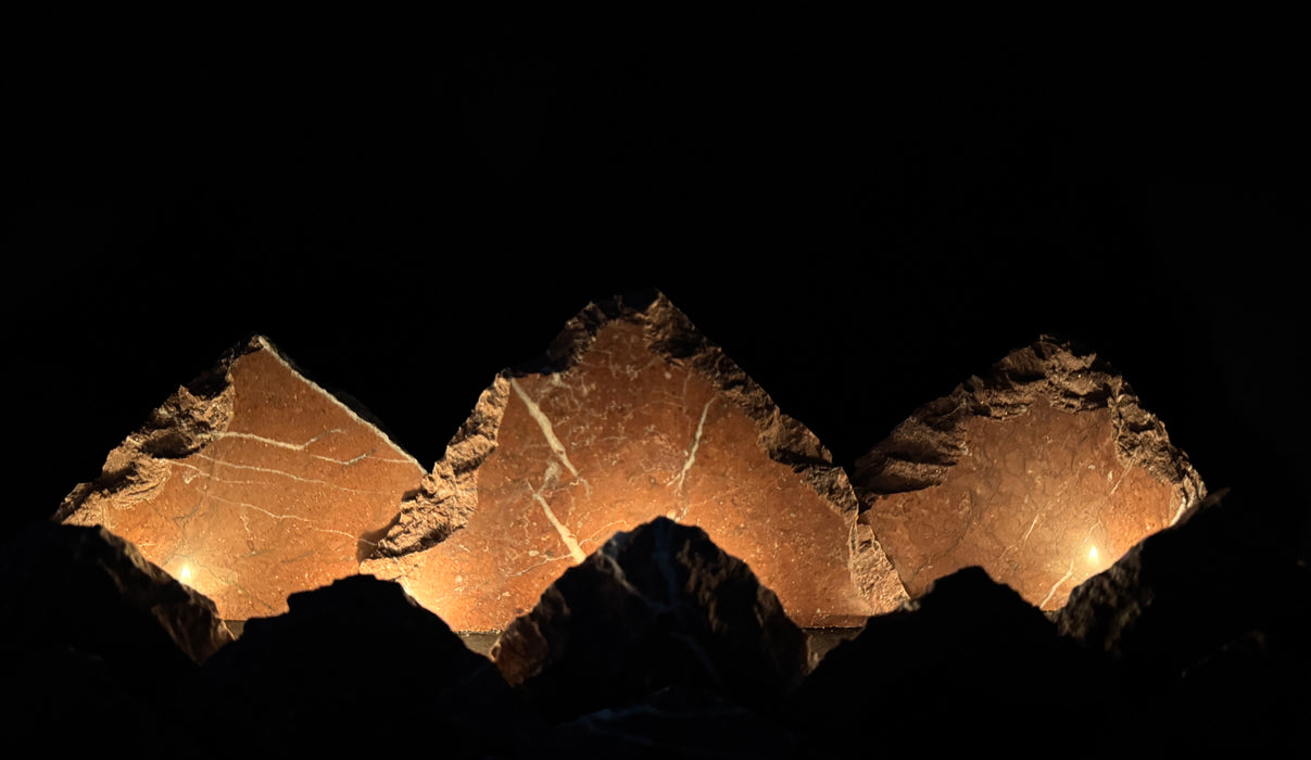Illuminated marble mountainscape.