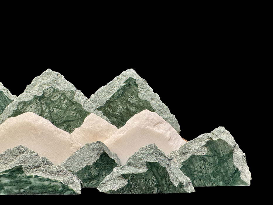 Illuminated marble mountainscape.