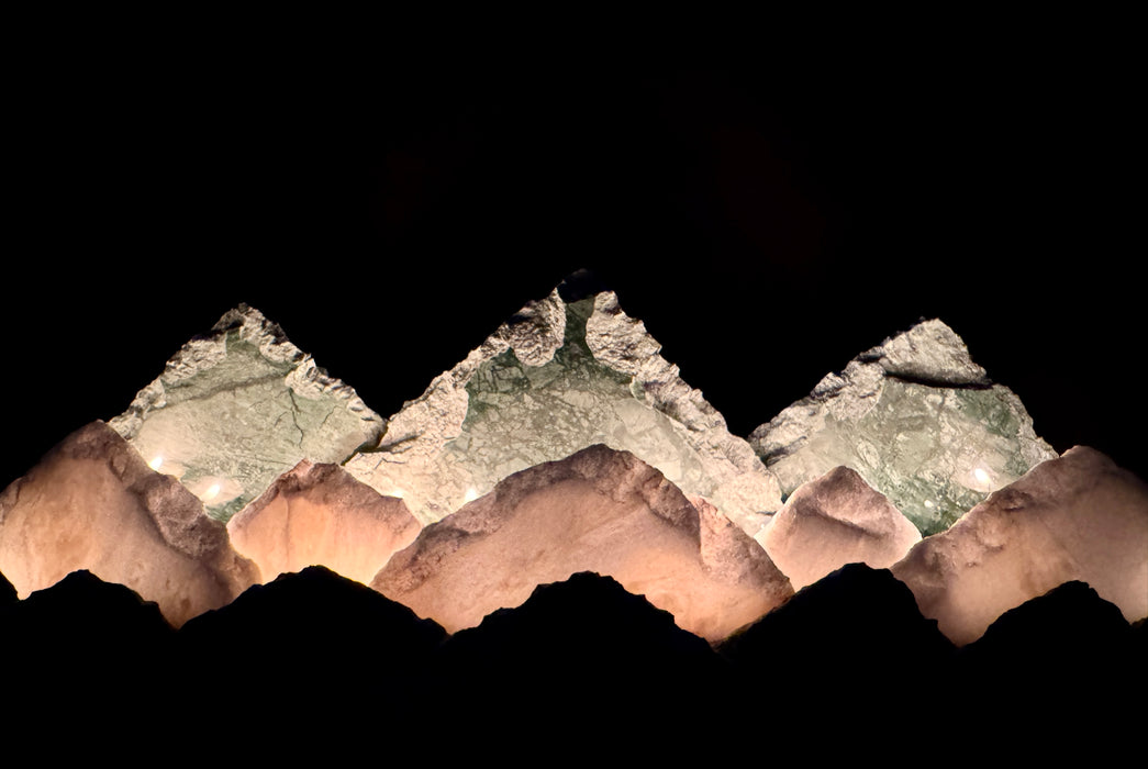 Illuminated marble mountainscape.
