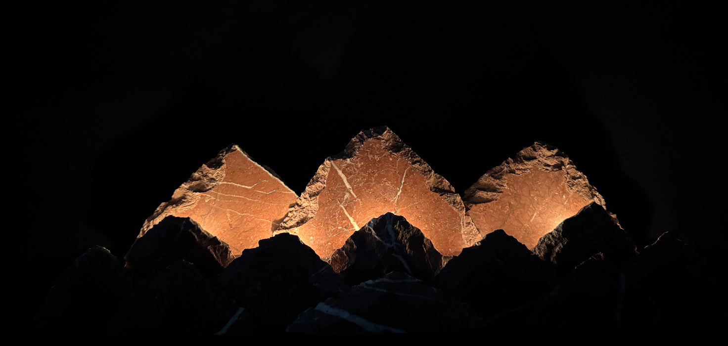 Illuminated marble mountainscape.
