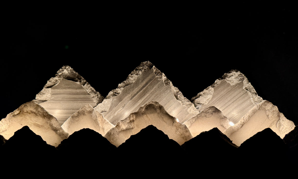 Illuminated marble mountainscape.