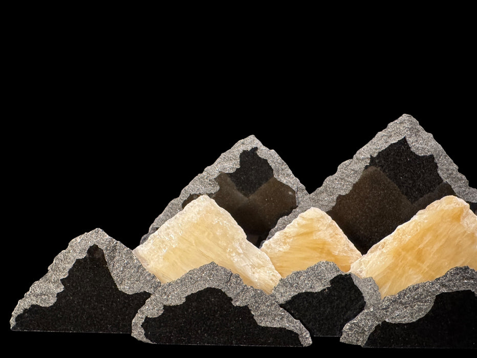 Illuminated University of Colorado onyx mountainscape.