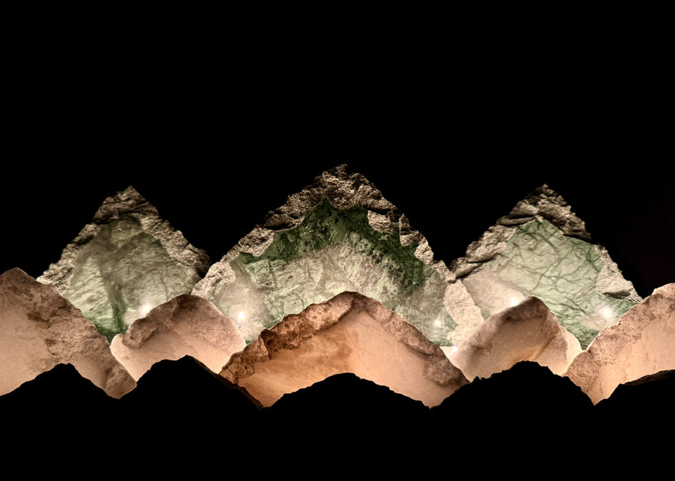 Illuminated marble mountainscape.