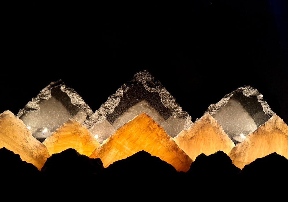 Illuminated University of Colorado onyx mountainscape.
