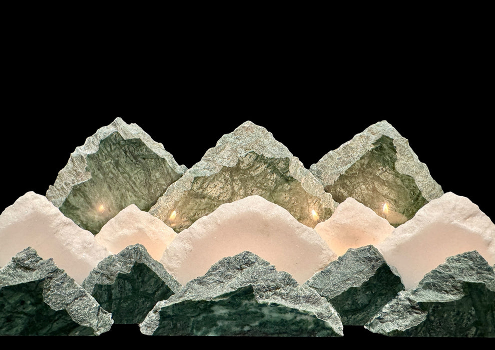 Illuminated marble mountainscape.