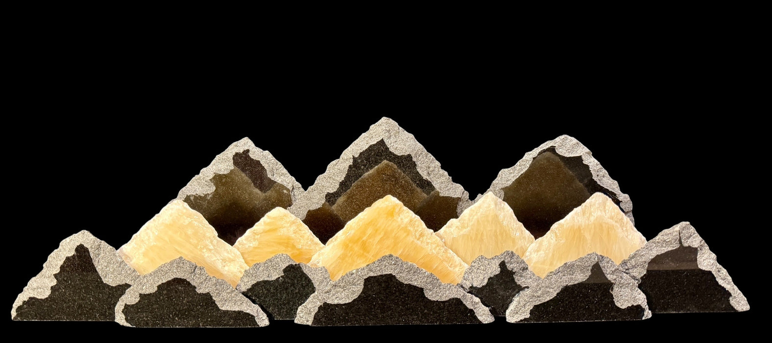 Illuminated University of Colorado onyx mountainscape.