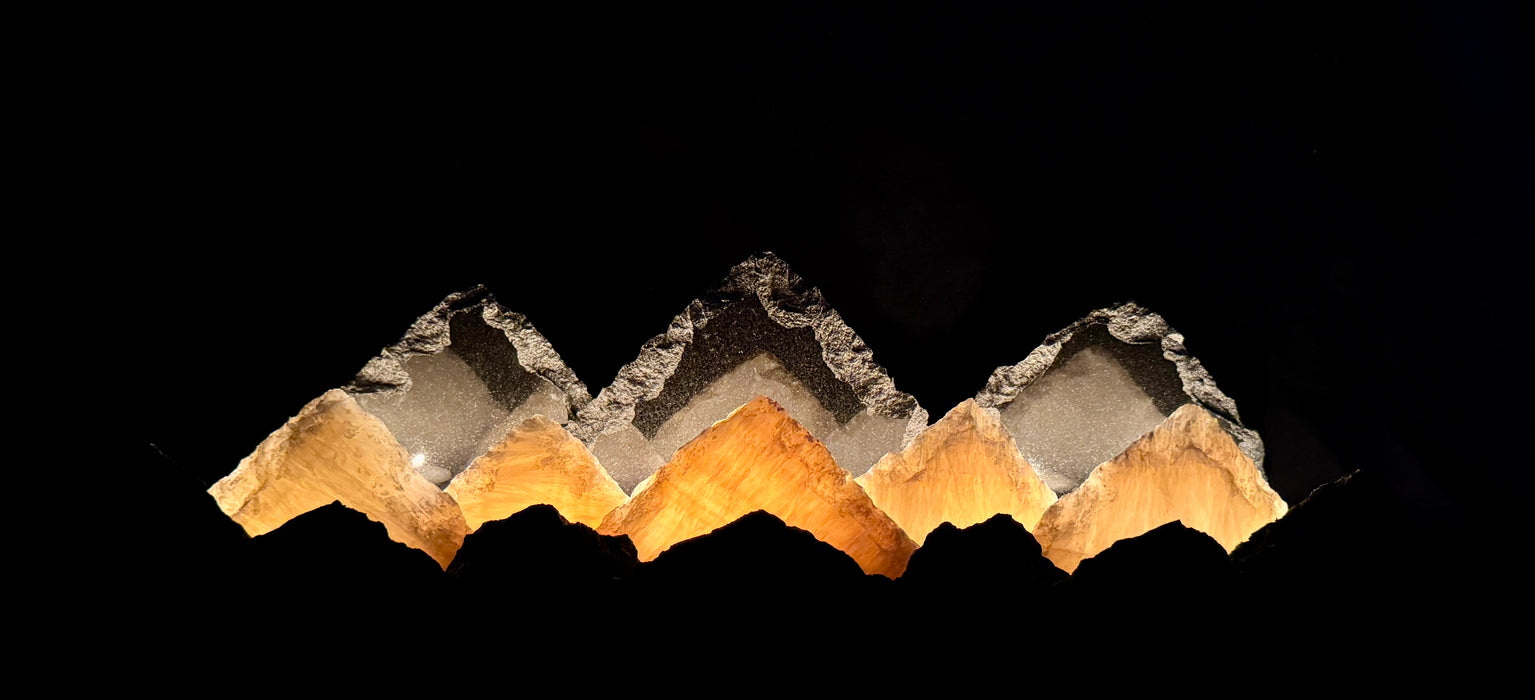 Illuminated University of Colorado onyx mountainscape.
