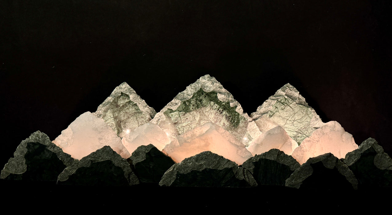 Illuminated marble mountainscape.