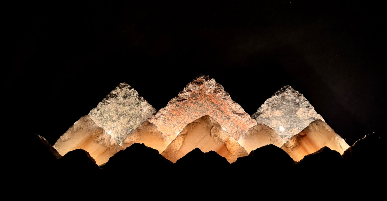 Illuminated marble mountainscape.