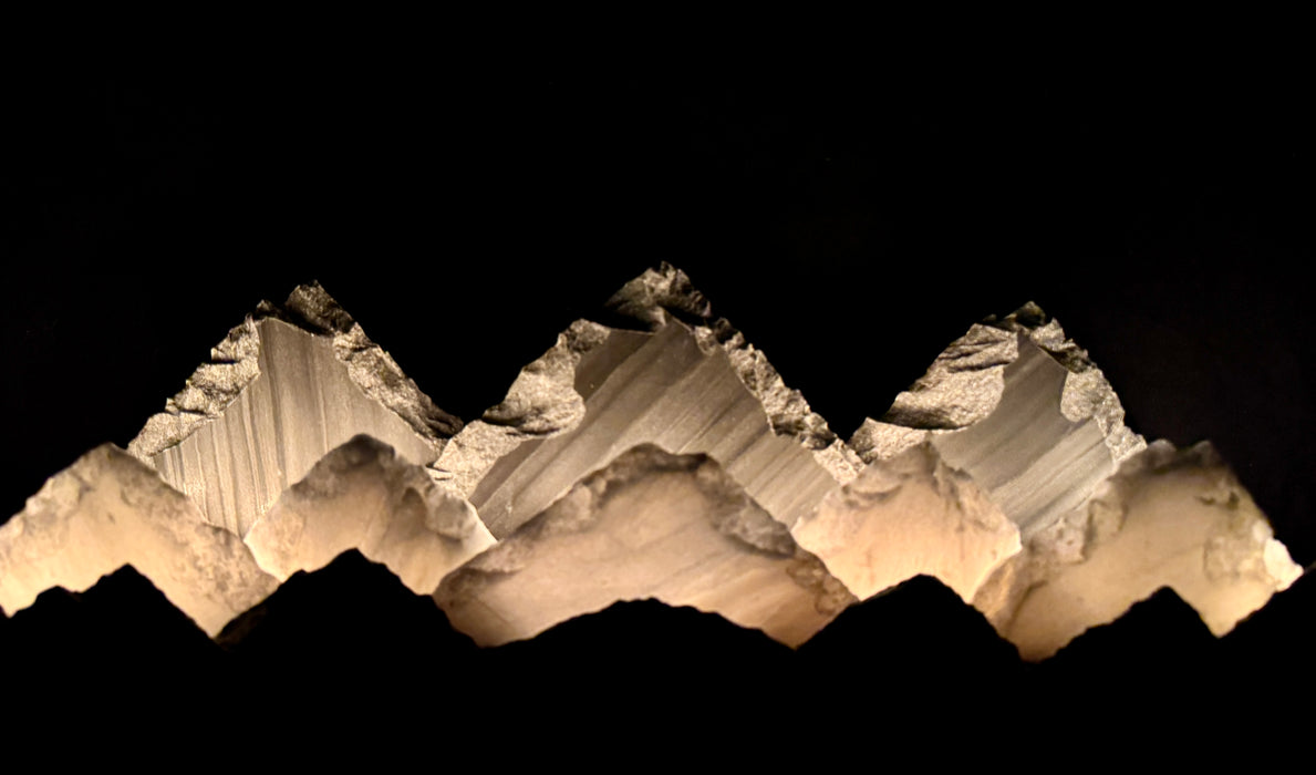 Illuminated marble mountainscape
