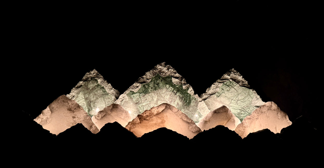 Illuminated marble mountainscape.
