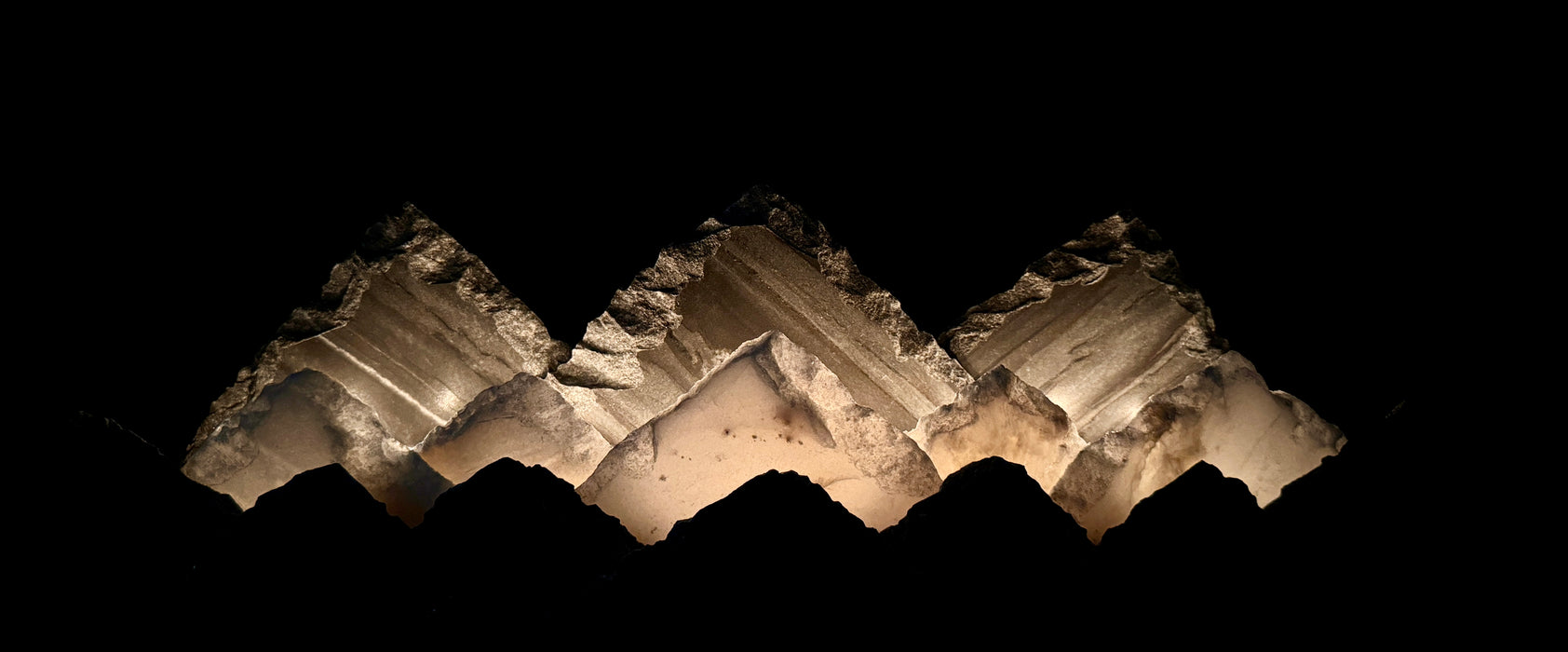 Illuminated marble mountainscape