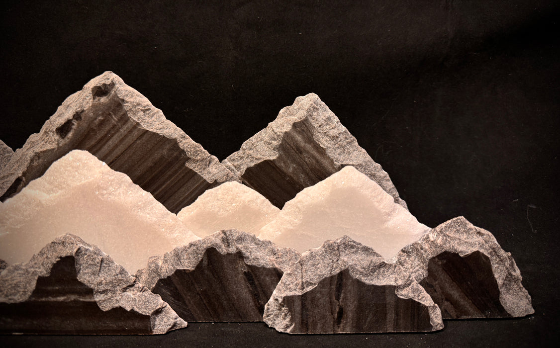 Illuminated marble mountainscape