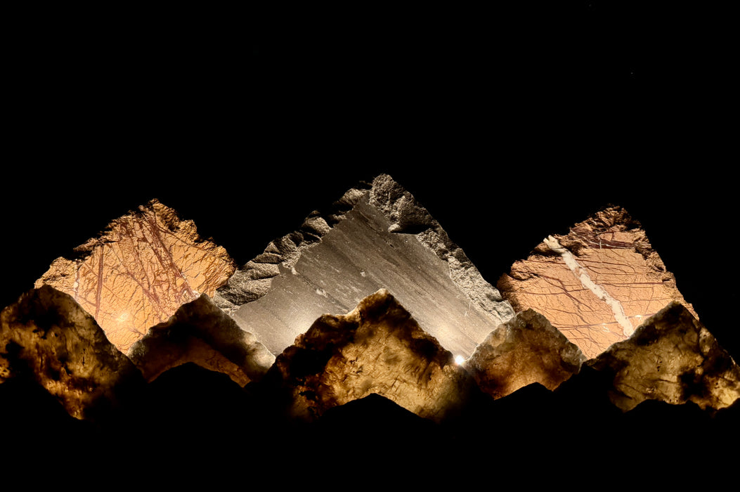 Illuminated labradorite mountainscape.