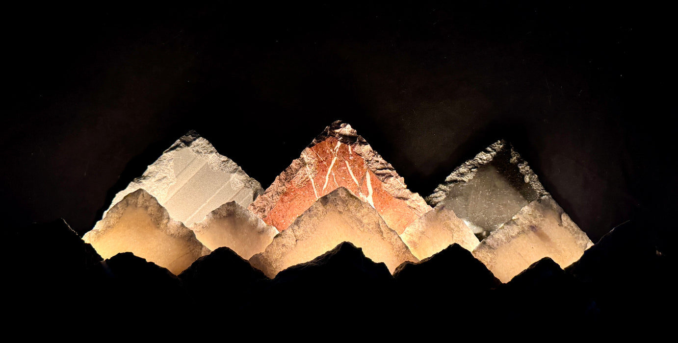 Illuminated marble mountainscape.