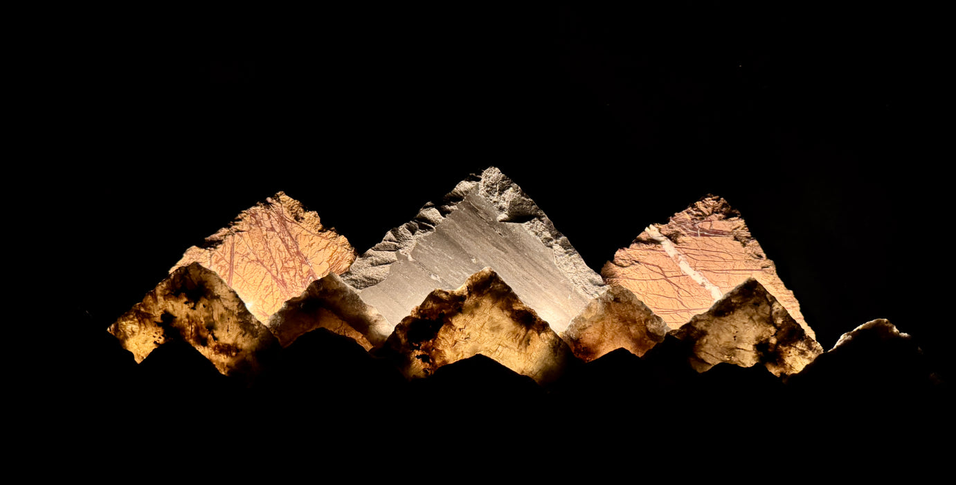 Illuminated labradorite mountainscape.