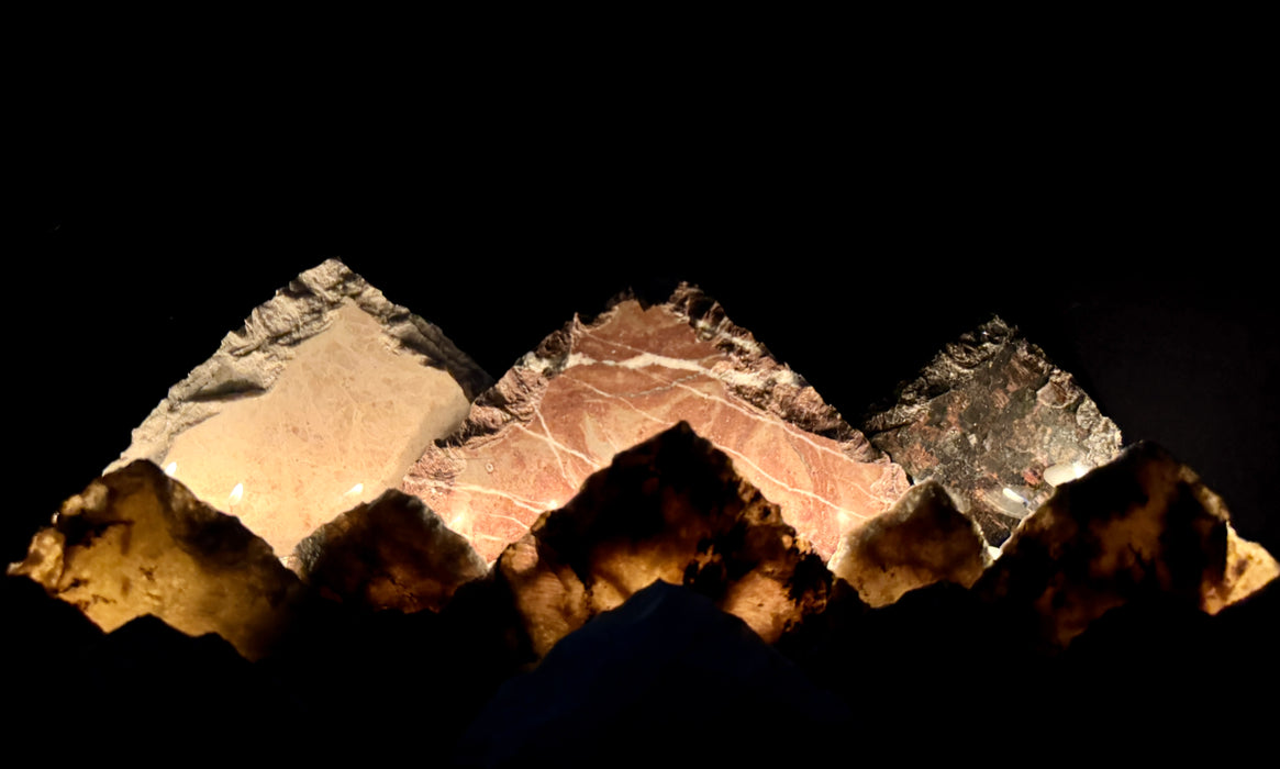 Illuminated labradorite mountainscape.