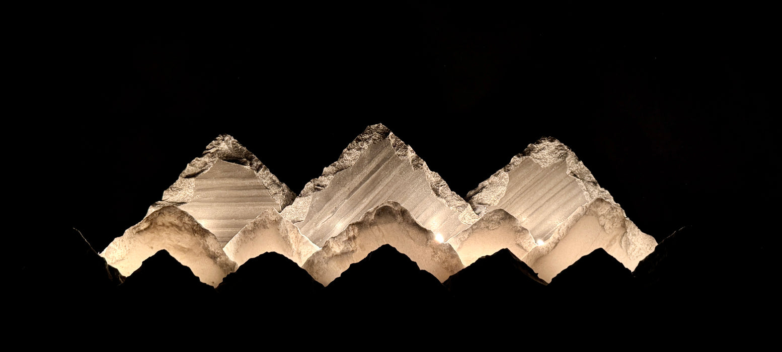 Illuminated marble mountainscape.