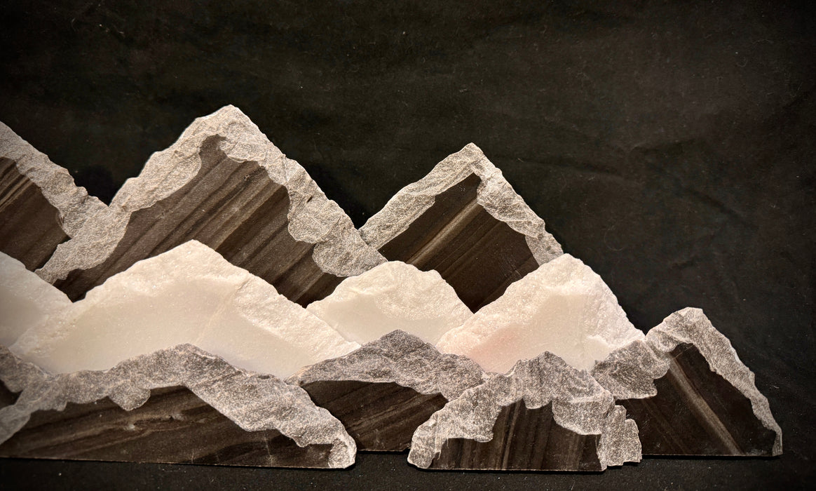 Illuminated marble mountainscape