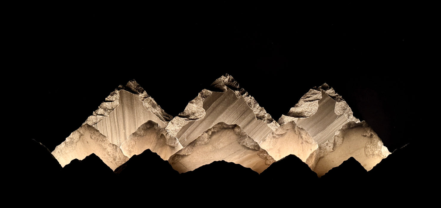 Illuminated marble mountainscape
