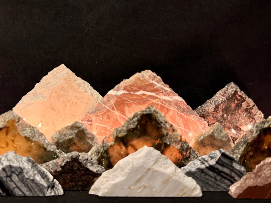 Illuminated labradorite mountainscape.