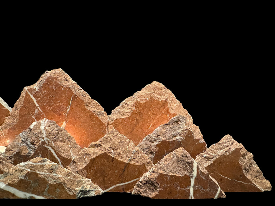 Illuminated marble mountainscape.
