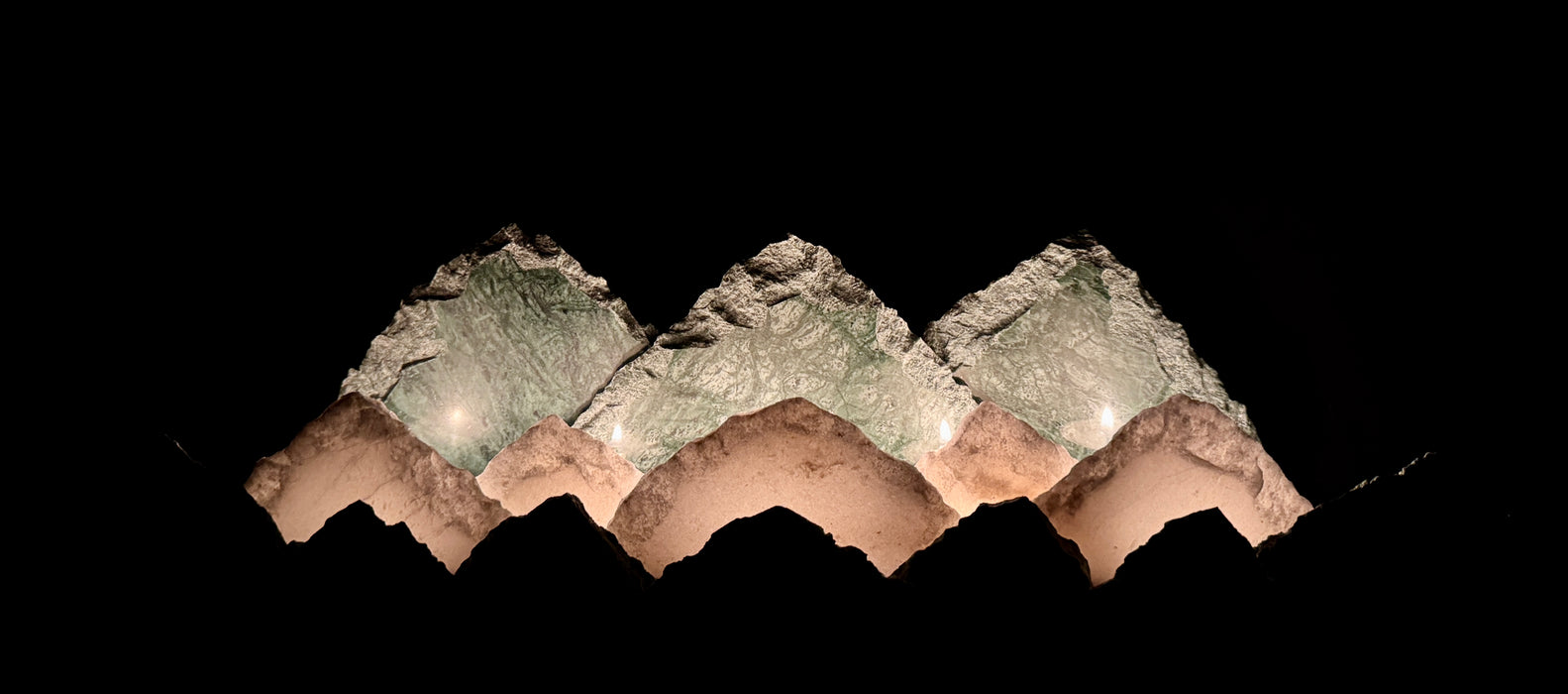 Illuminated marble mountainscape.