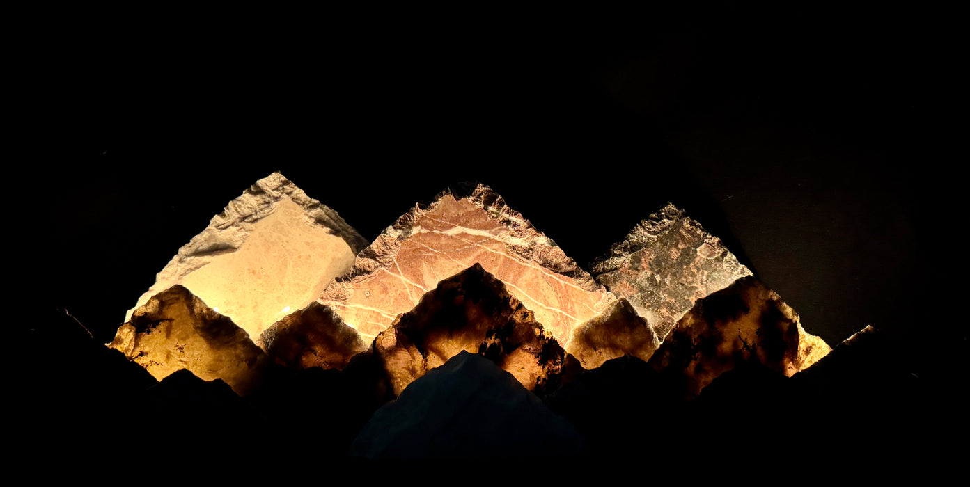 Illuminated labradorite mountainscape.