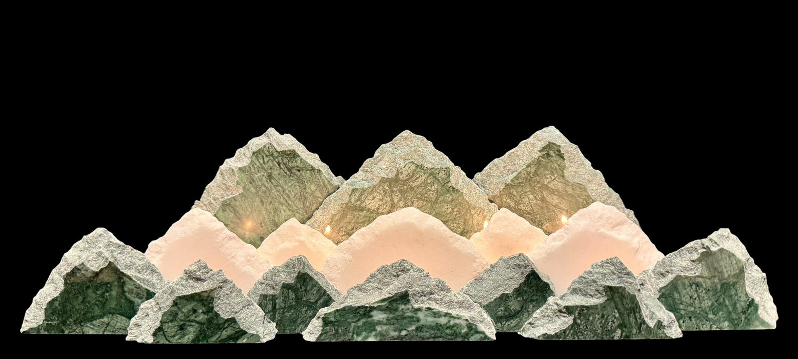 Illuminated marble mountainscape.
