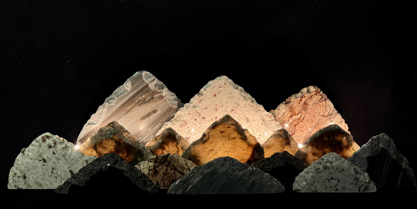 Illuminated labradorite mountainscape.