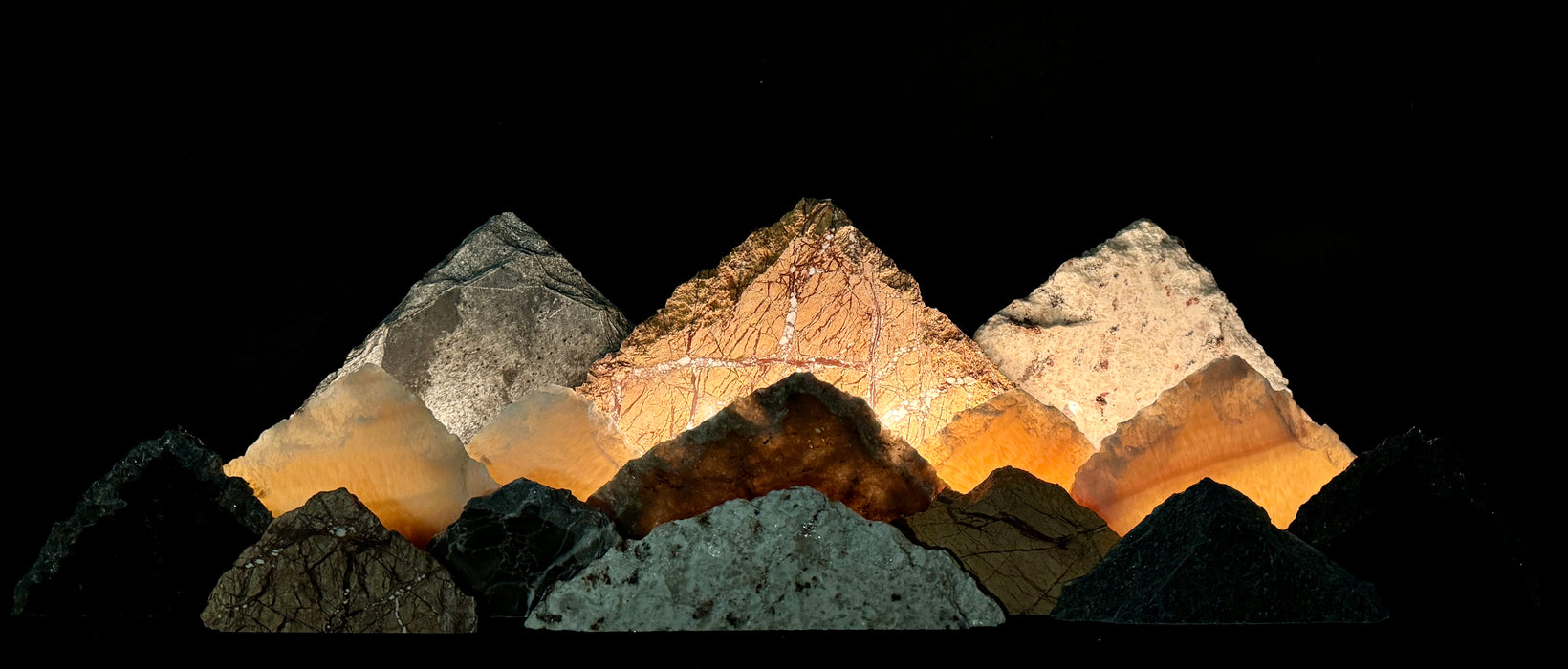 Illuminated onyx/labradorte mountainscape