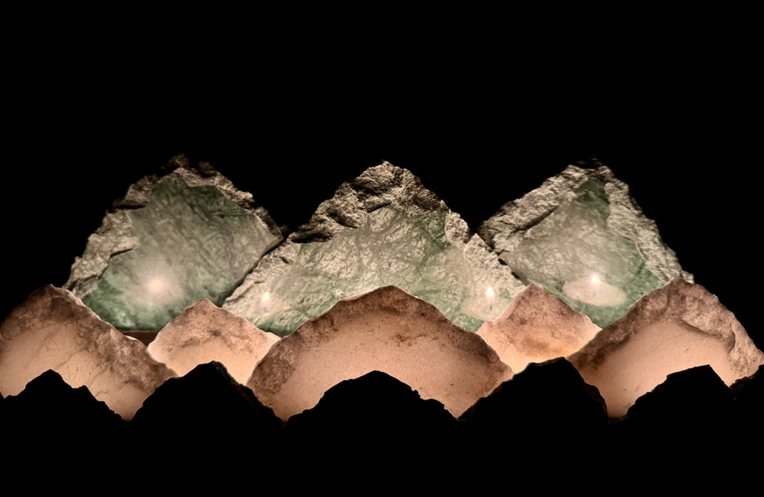 Illuminated marble mountainscape.
