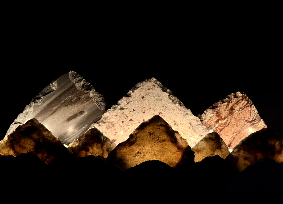 Illuminated labradorite mountainscape.