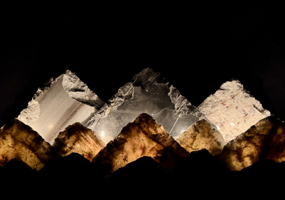 Illuminated labradorite mountainscape.