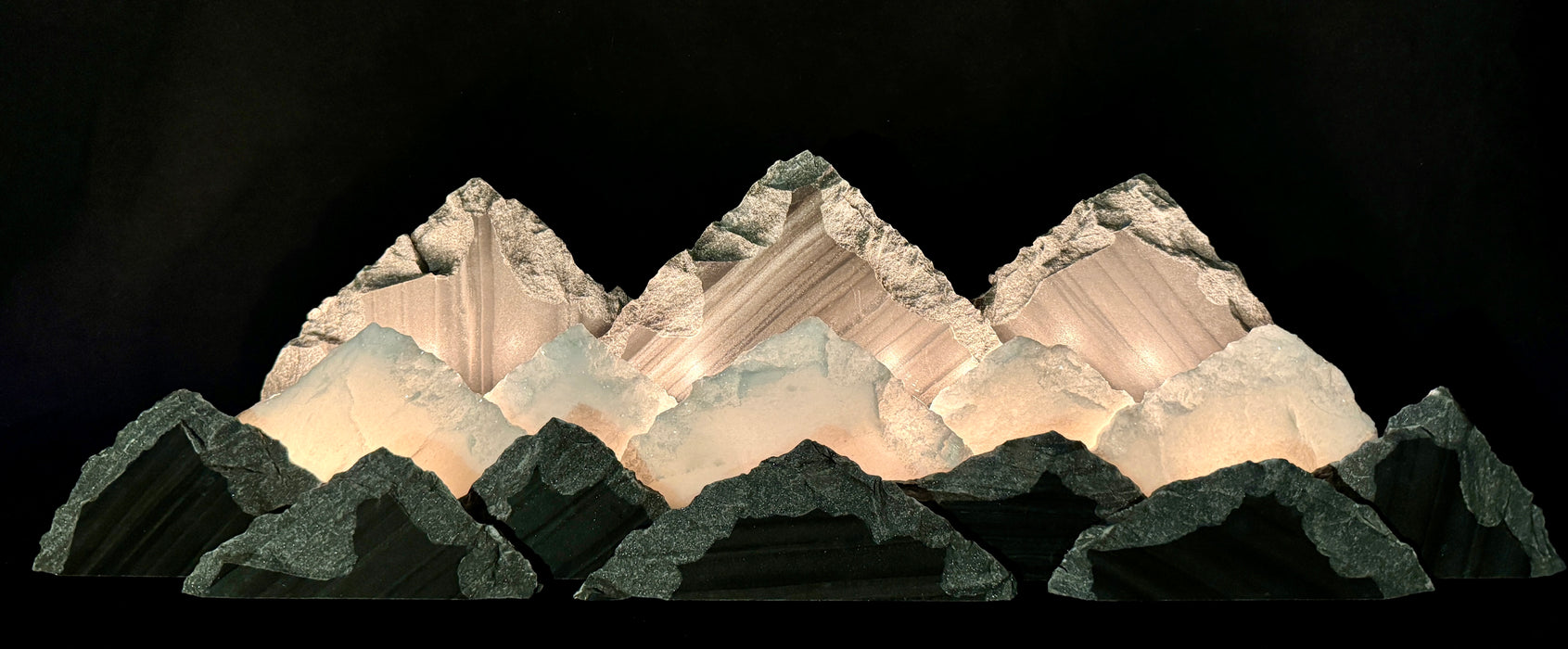 Illuminated marble mountainscape.