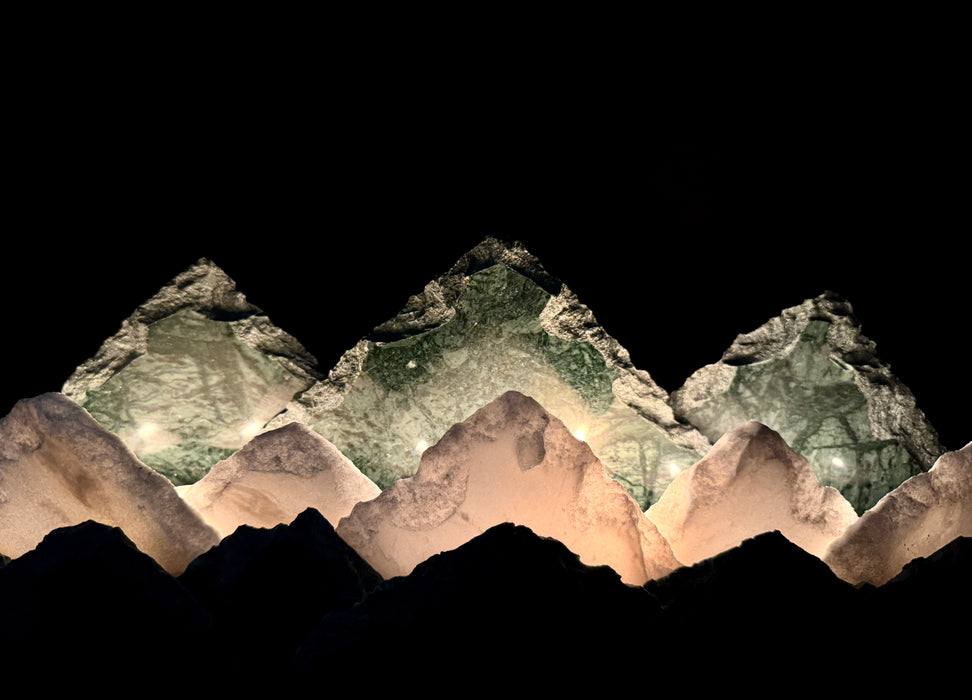 Illuminated marble mountainscape.