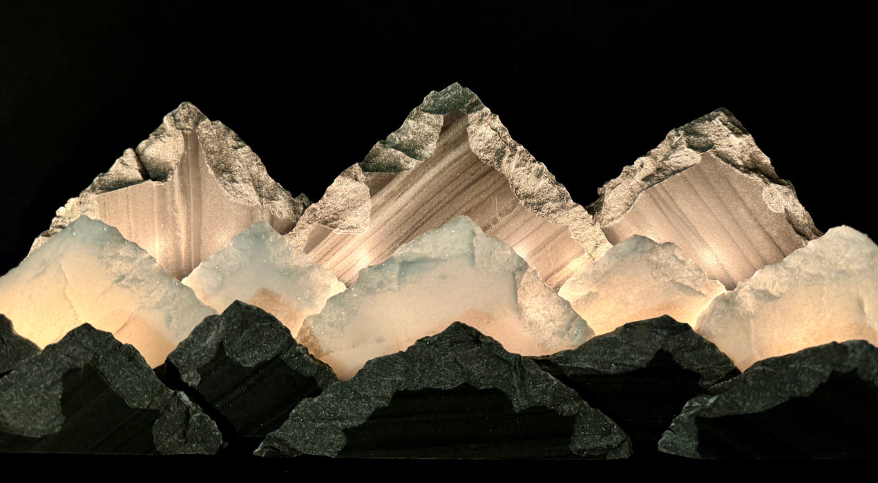 Illuminated marble mountainscape.