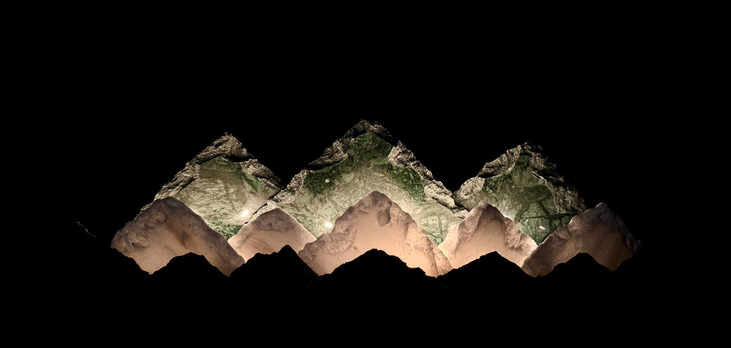 Illuminated marble mountainscape.