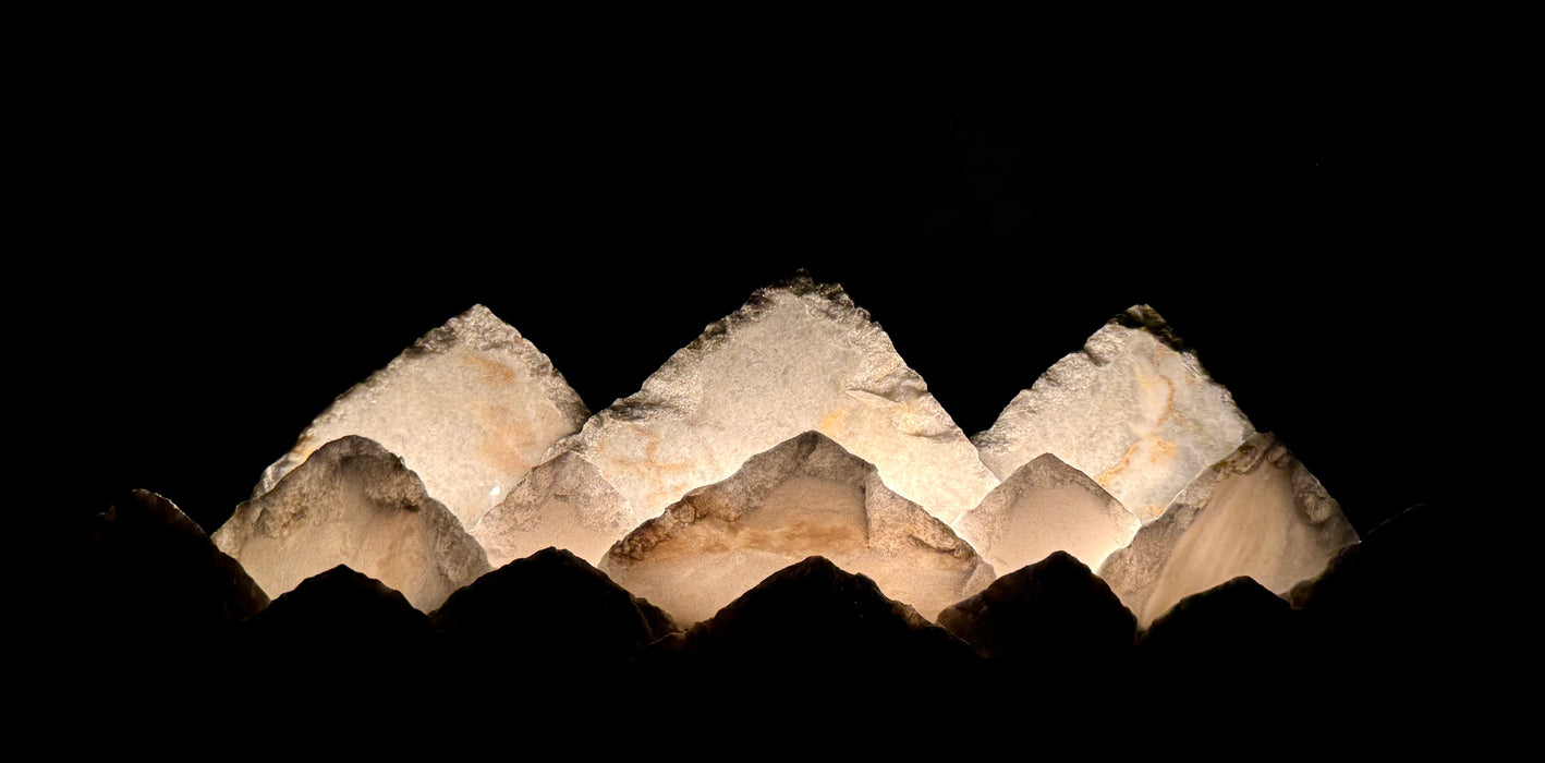 Illuminated marble mountainscape.