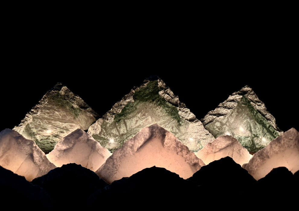 Illuminated marble mountainscape.