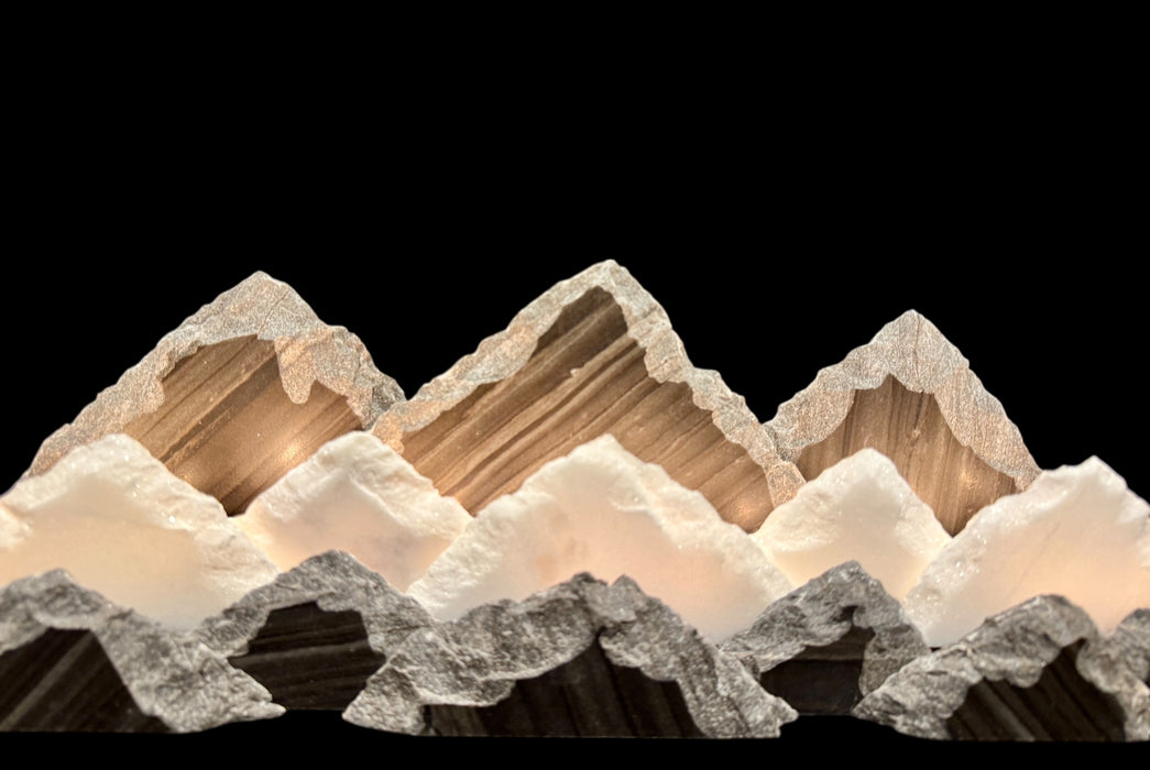 Illuminated marble mountainscape