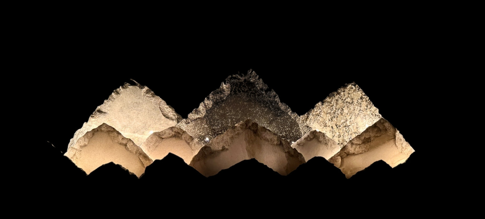 Illuminated marble mountainscape.