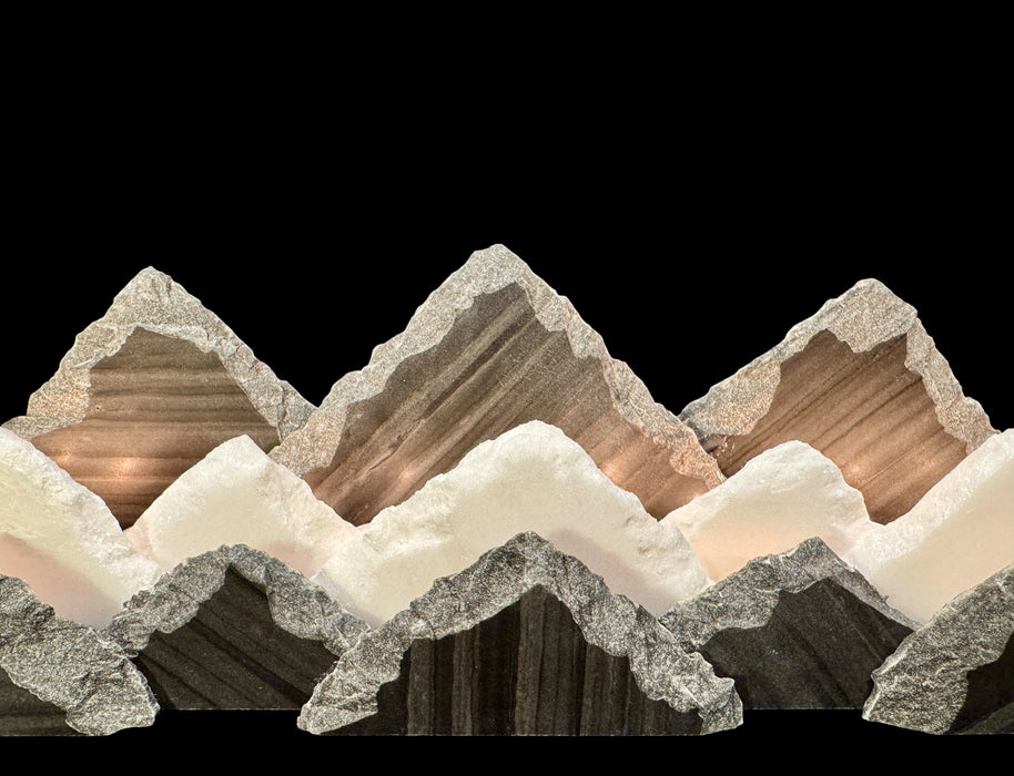 Illuminated marble mountainscape.