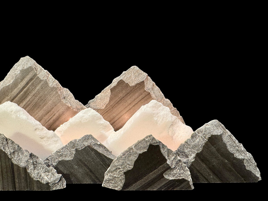 Illuminated marble mountainscape.